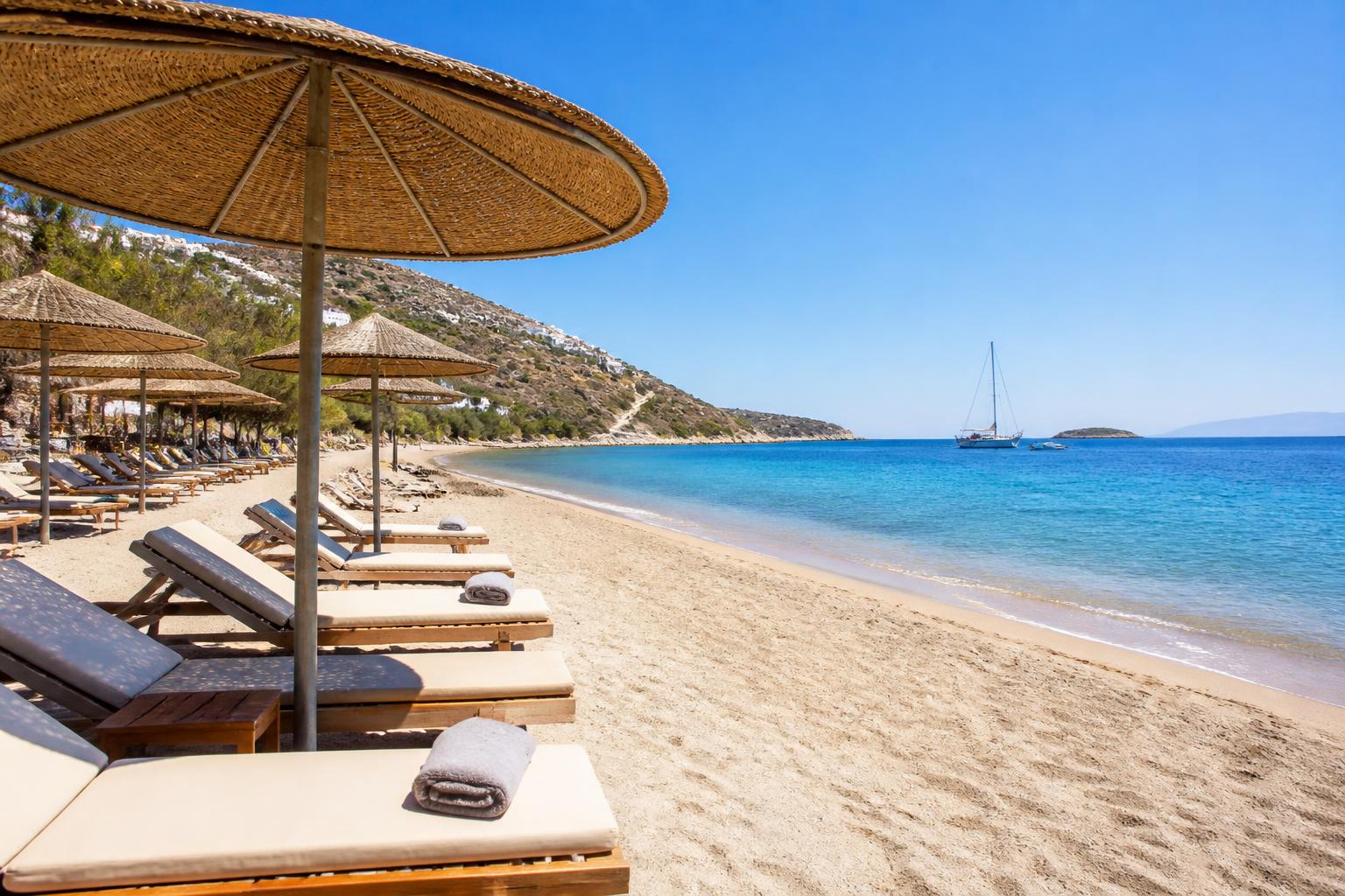 Sunbeds and umbrellas on Sitia beach